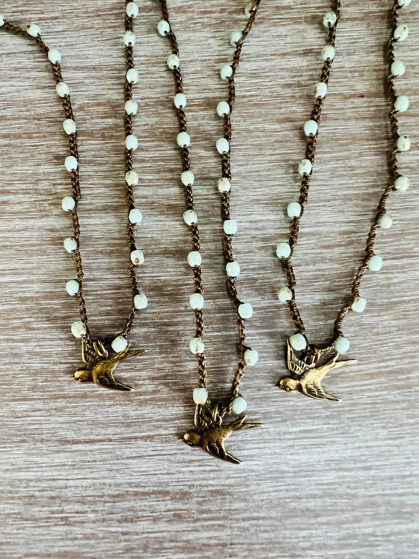 Split Tail Swallow Charm Necklace With Golden Mint Crystal