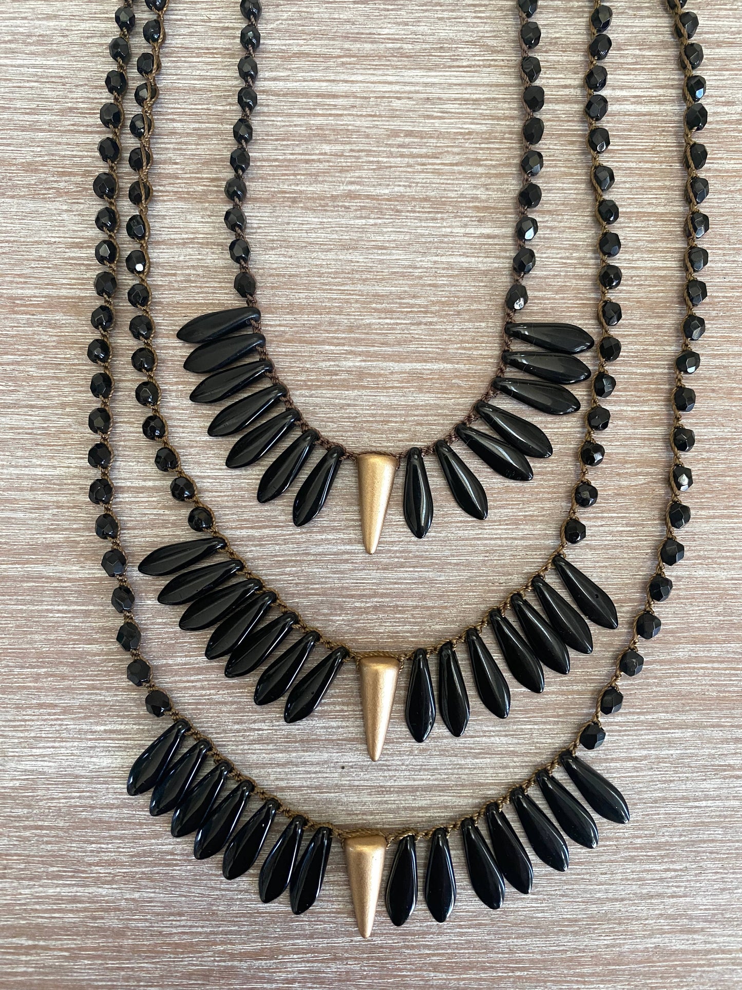 Thorn and Dagger Knotted Crystal Necklace In Black