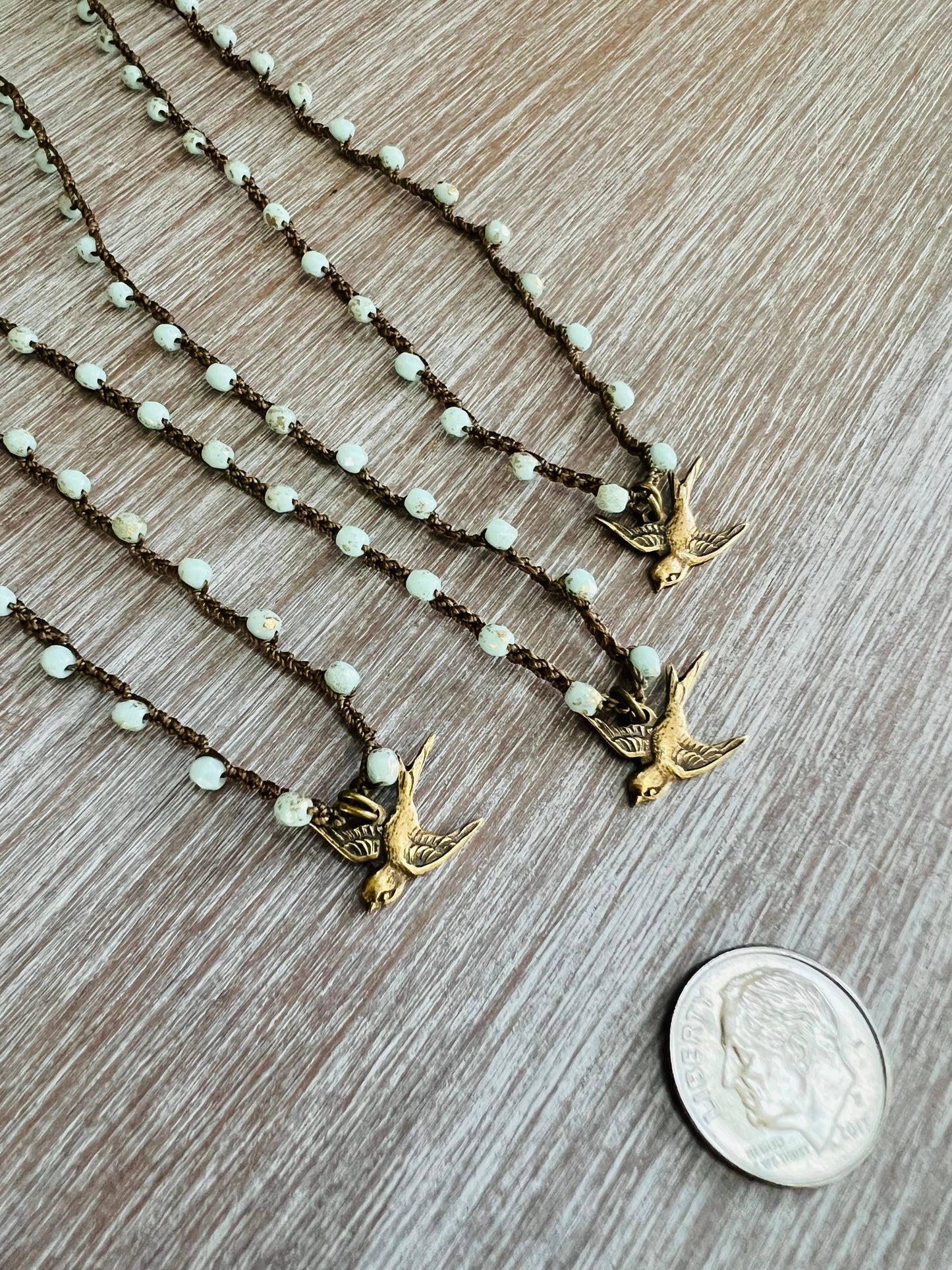 Split Tail Swallow Charm Necklace With Golden Mint Crystal