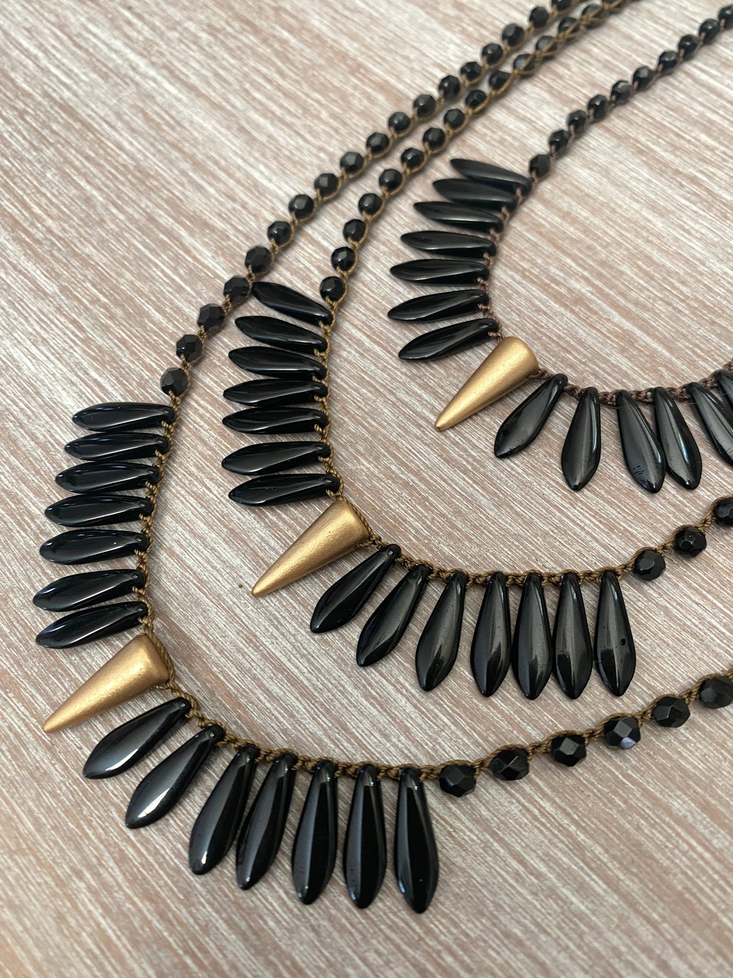 Thorn and Dagger Knotted Crystal Necklace In Black