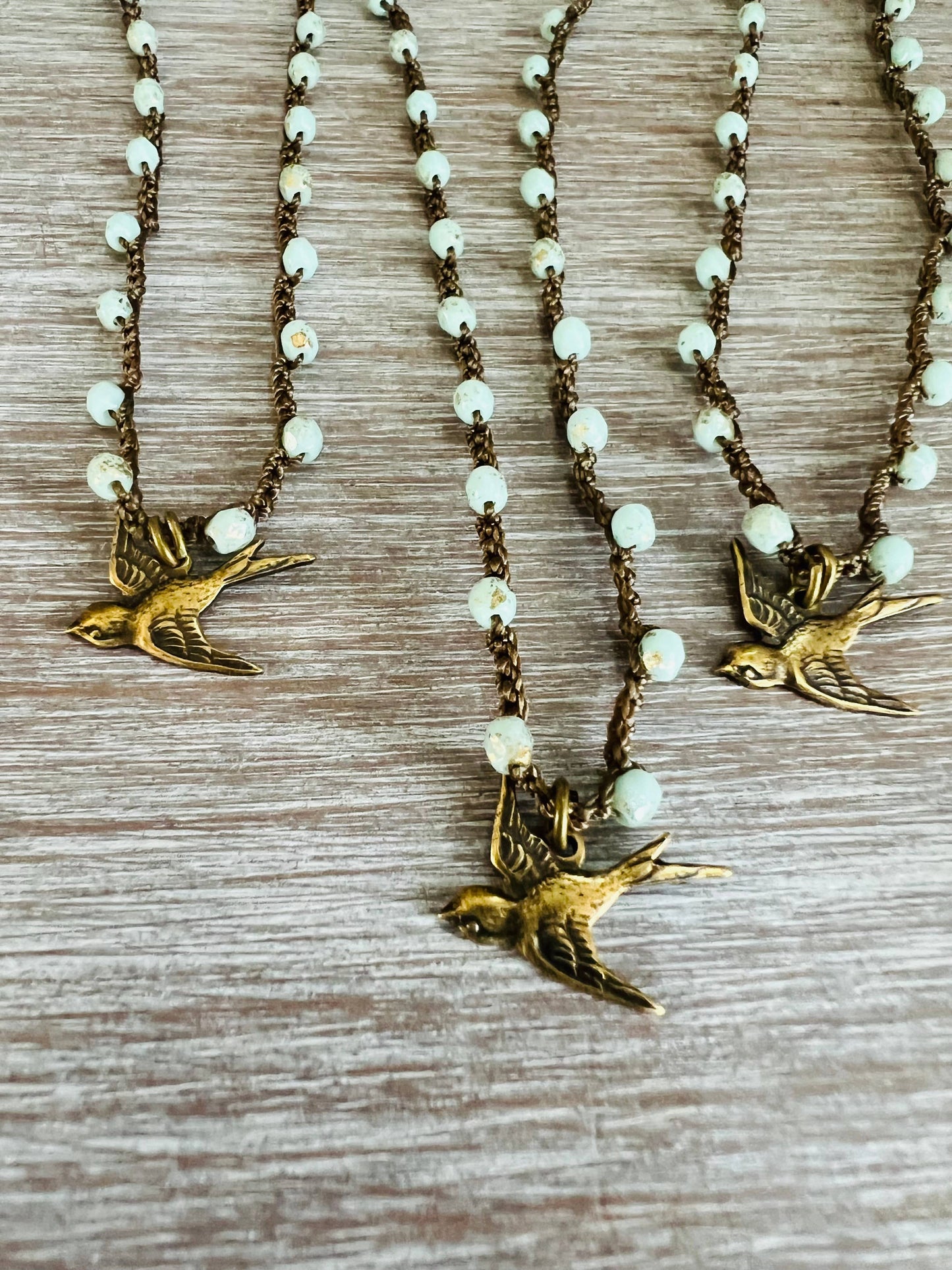 Split Tail Swallow Charm Necklace With Golden Mint Crystal