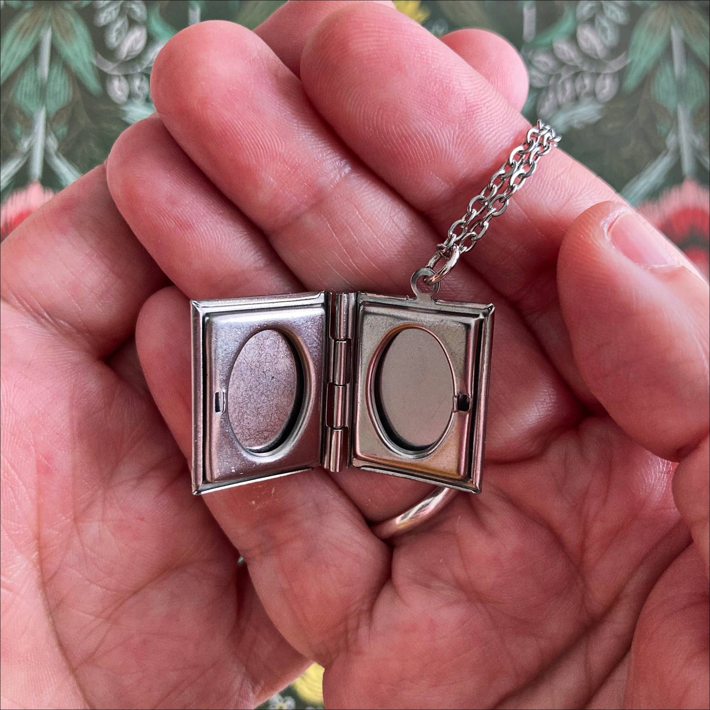 Book Locket Dracula - Black with Lingering Hand - Stainless Steel