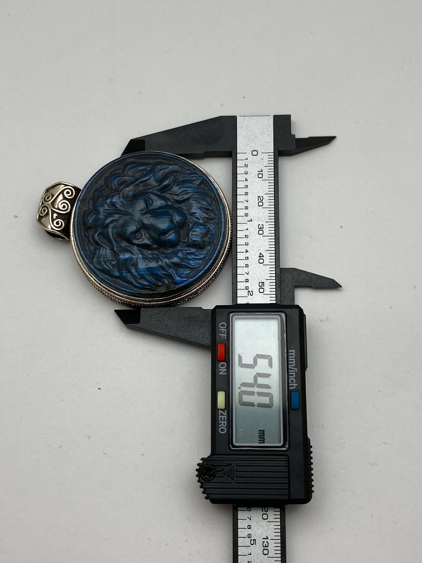 Labradorite carved lion pendant, handcrafted, white metal