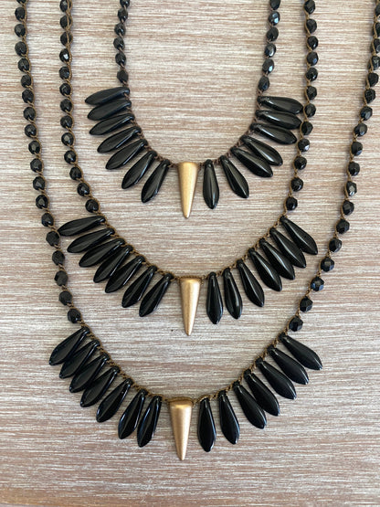 Thorn and Dagger Knotted Crystal Necklace In Black