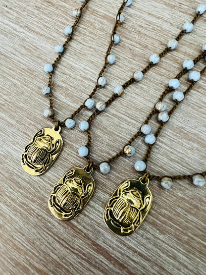Golden Scarab Charm Necklace With Blue Crystal Strand