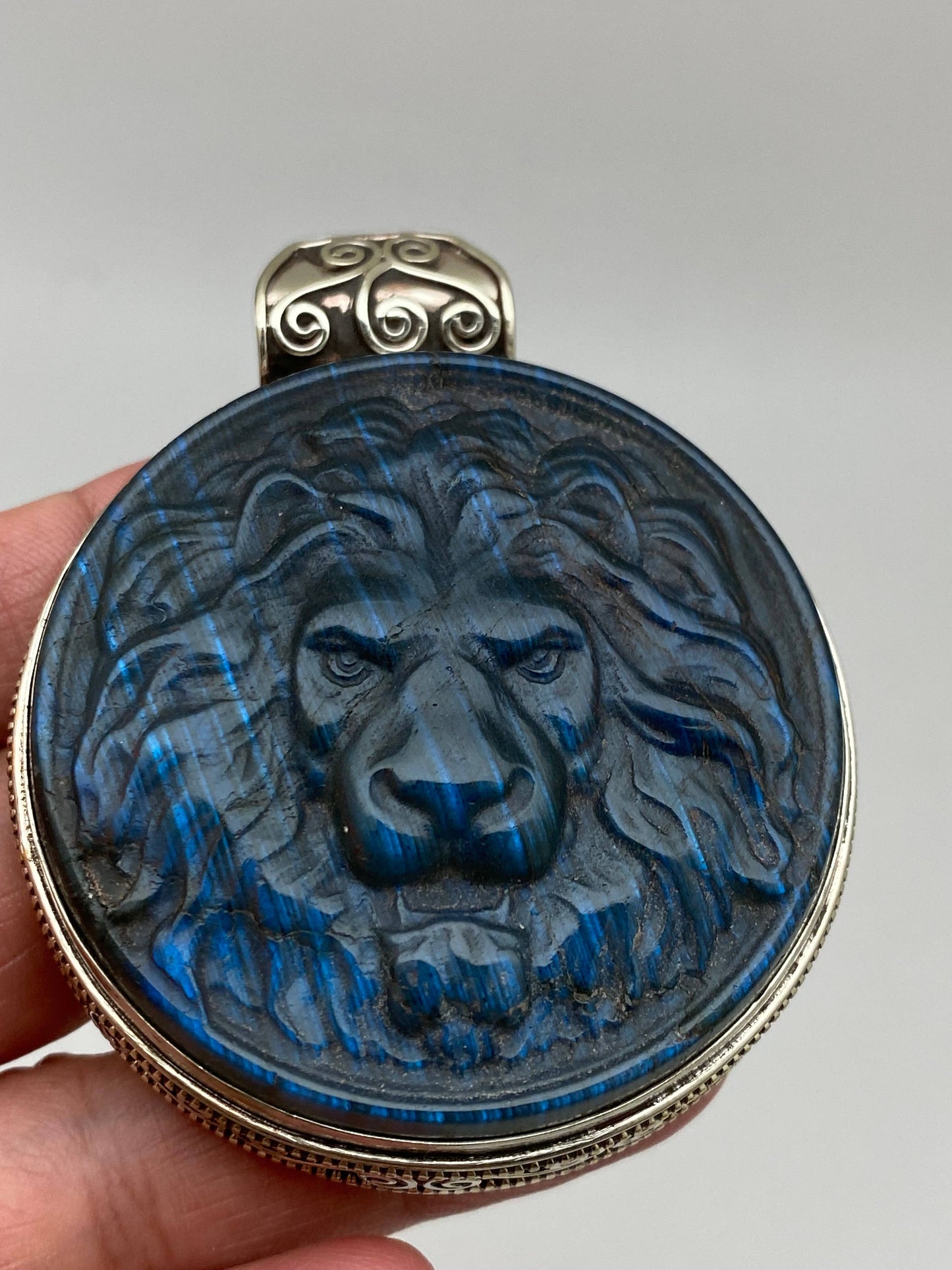 Labradorite carved lion pendant, handcrafted, white metal