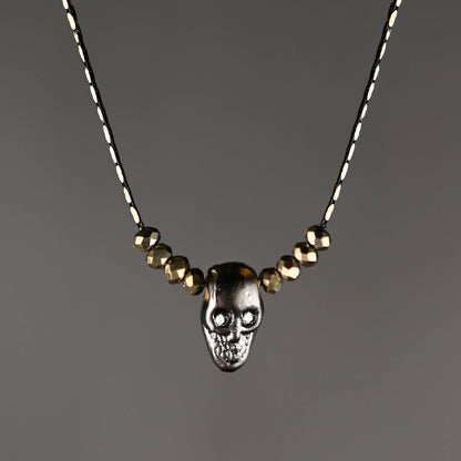 Hematite Skull w/ Gold Crystals & Crystal Eyes