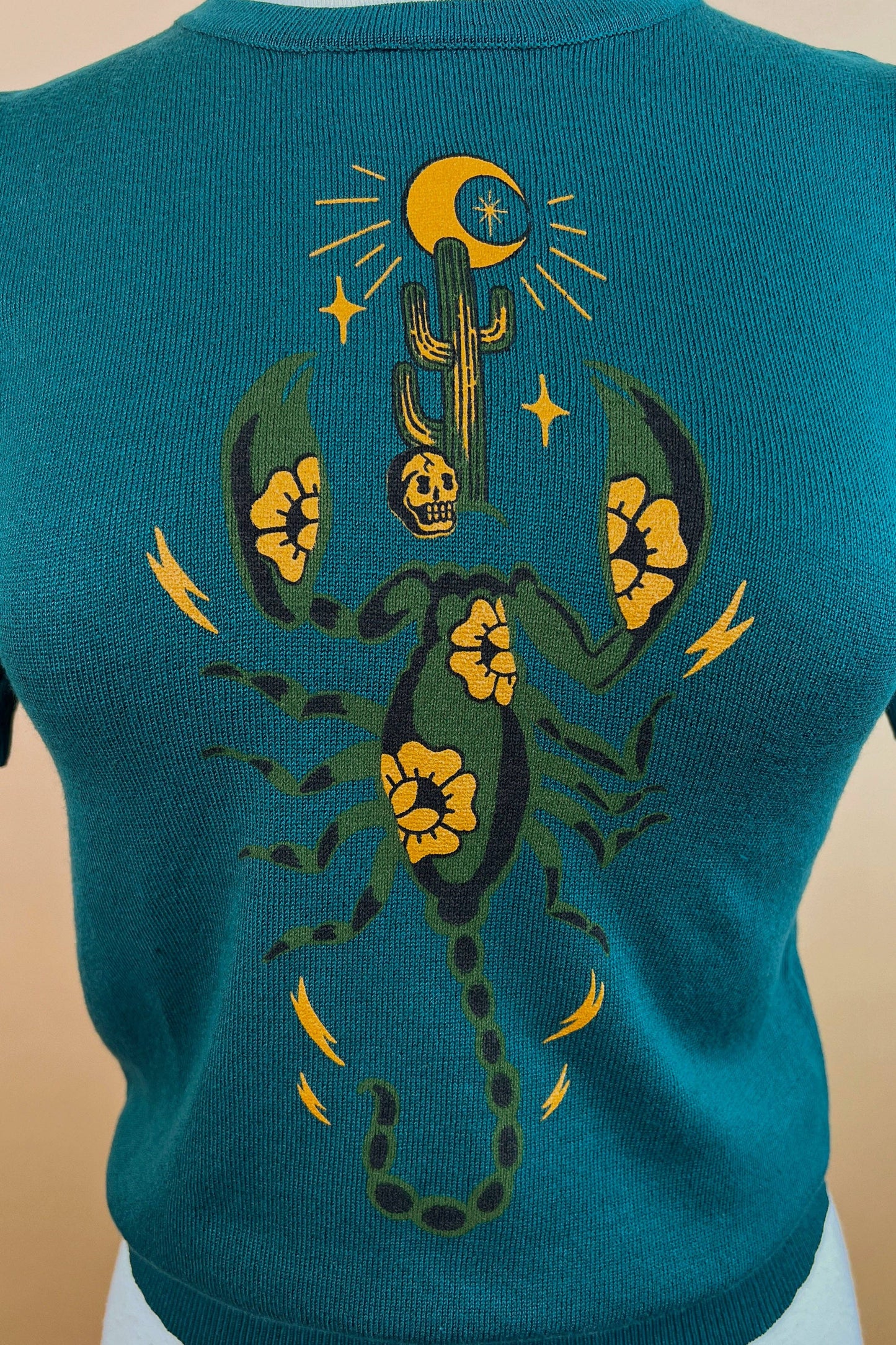 The Scorpion short sleeve Sweater in Peacock