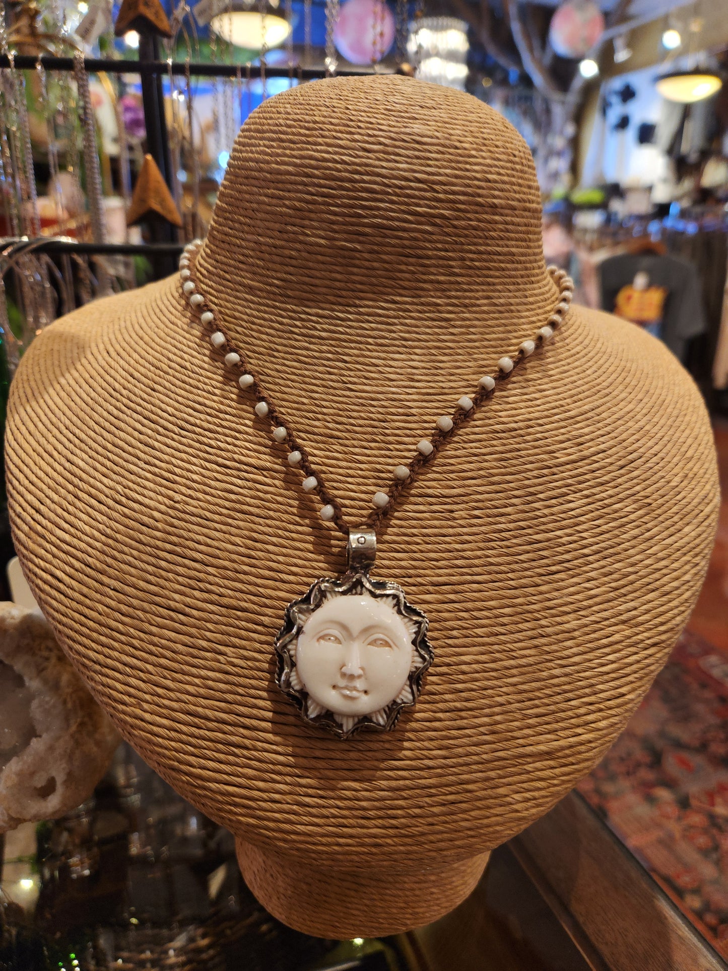 Carved Bone Sun Pendant on Beaded Necklace