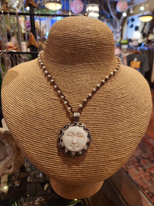 Carved Bone Sun Pendant on Beaded Necklace
