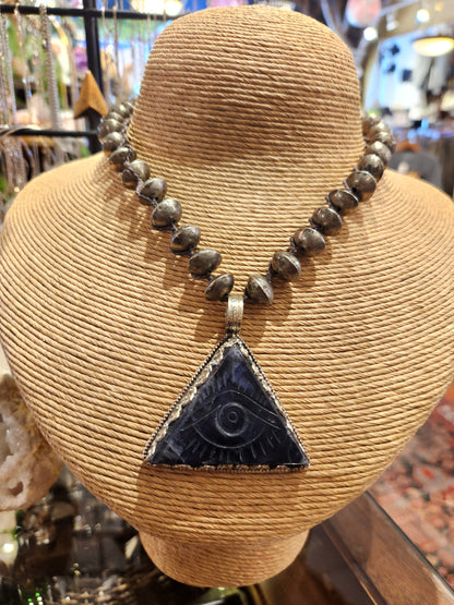 Carved Fluorite Eye Pendant