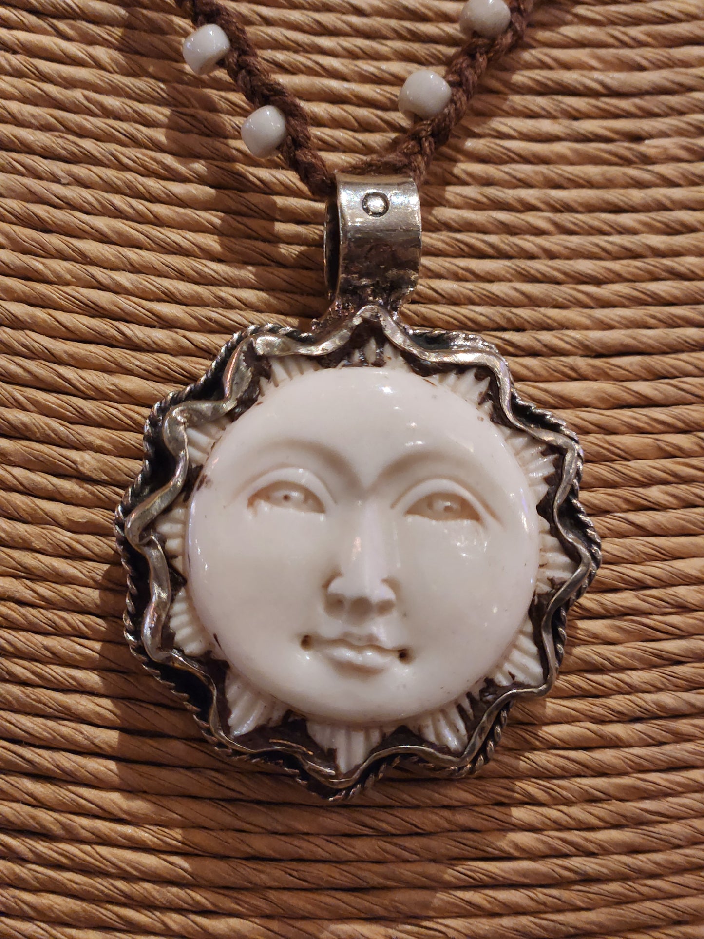 Carved Bone Sun Pendant on Beaded Necklace